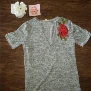 Women’s rose emblem, v cut out, t-shirt
